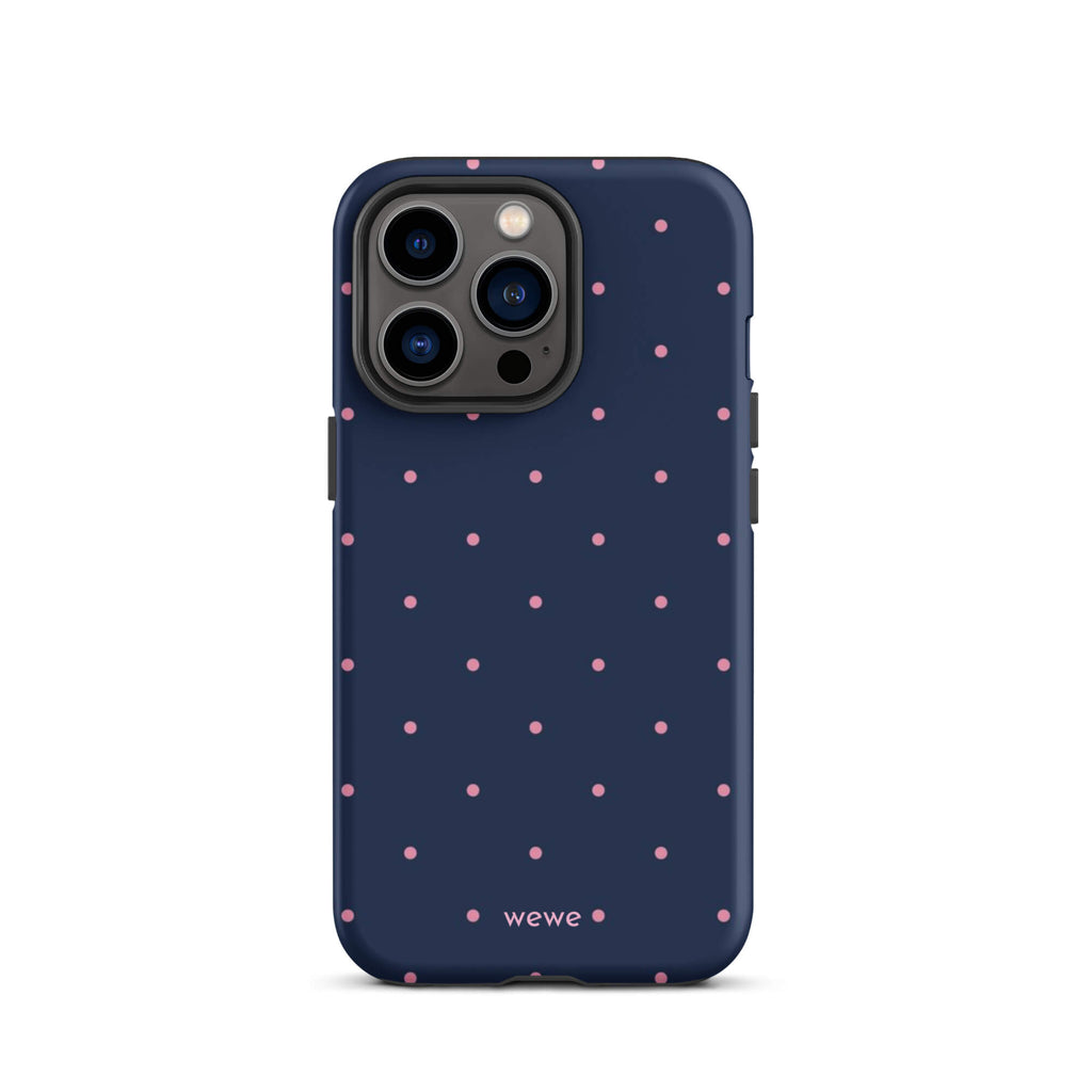 Custom iPhone case 13 pro with a dark navy blue background and a pattern of small pink polka dots.
