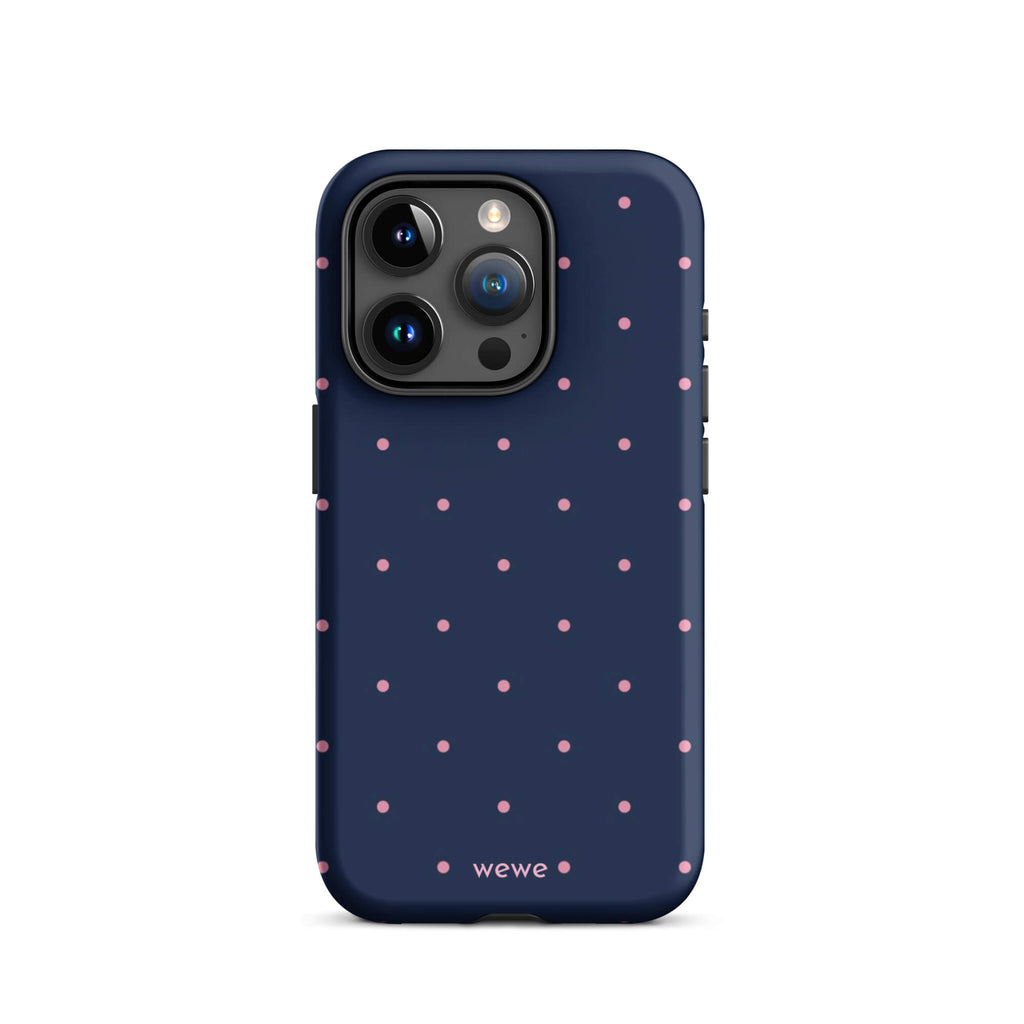 Custom iPhone case 15 pro with a dark navy blue background and a pattern of small pink polka dots.
