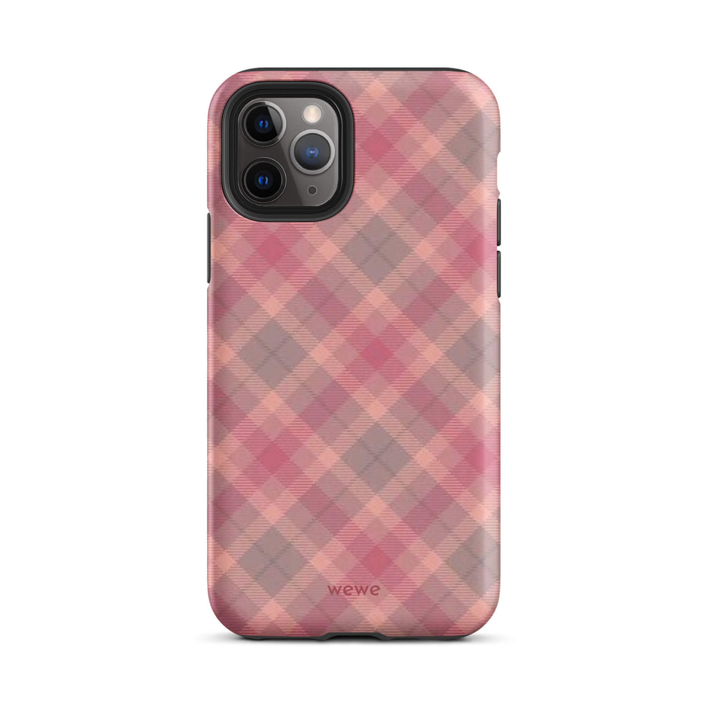Custom iPhone case 11 pro with a soft, faded checkered pattern of pink, mauve, and gray diagonal lines, resembling a classic tartan plaid.