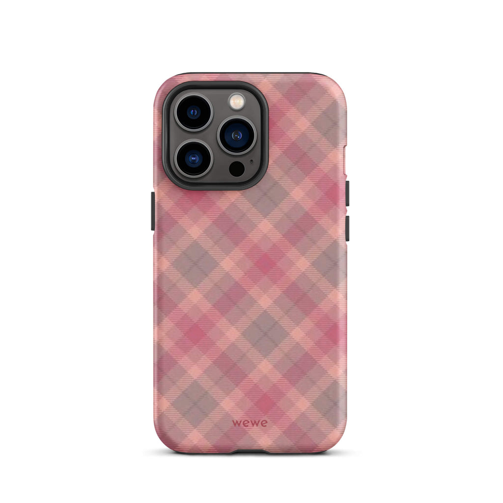 Custom iPhone case 13 pro with a soft, faded checkered pattern of pink, mauve, and gray diagonal lines, resembling a classic tartan plaid.