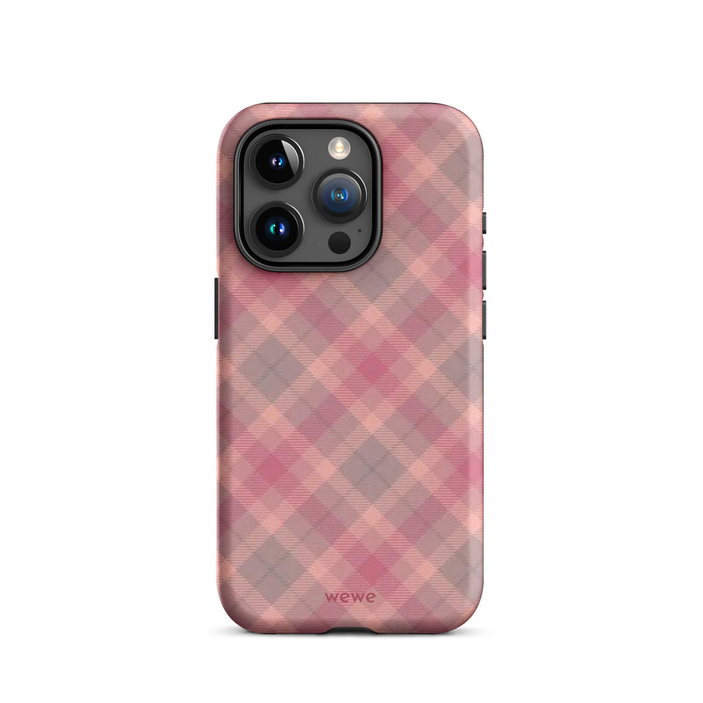 Custom iPhone case 15 pro with a soft, faded checkered pattern of pink, mauve, and gray diagonal lines, resembling a classic tartan plaid.