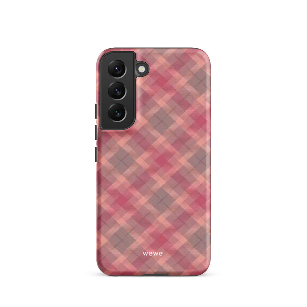 Custom samsung galaxy s22 with a soft, faded checkered pattern of pink, mauve, and gray diagonal lines, resembling a classic tartan plaid.