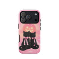 Bubblegum-pink iPhone case with two black cats wearing pink bows and a glowing jack-o-lantern