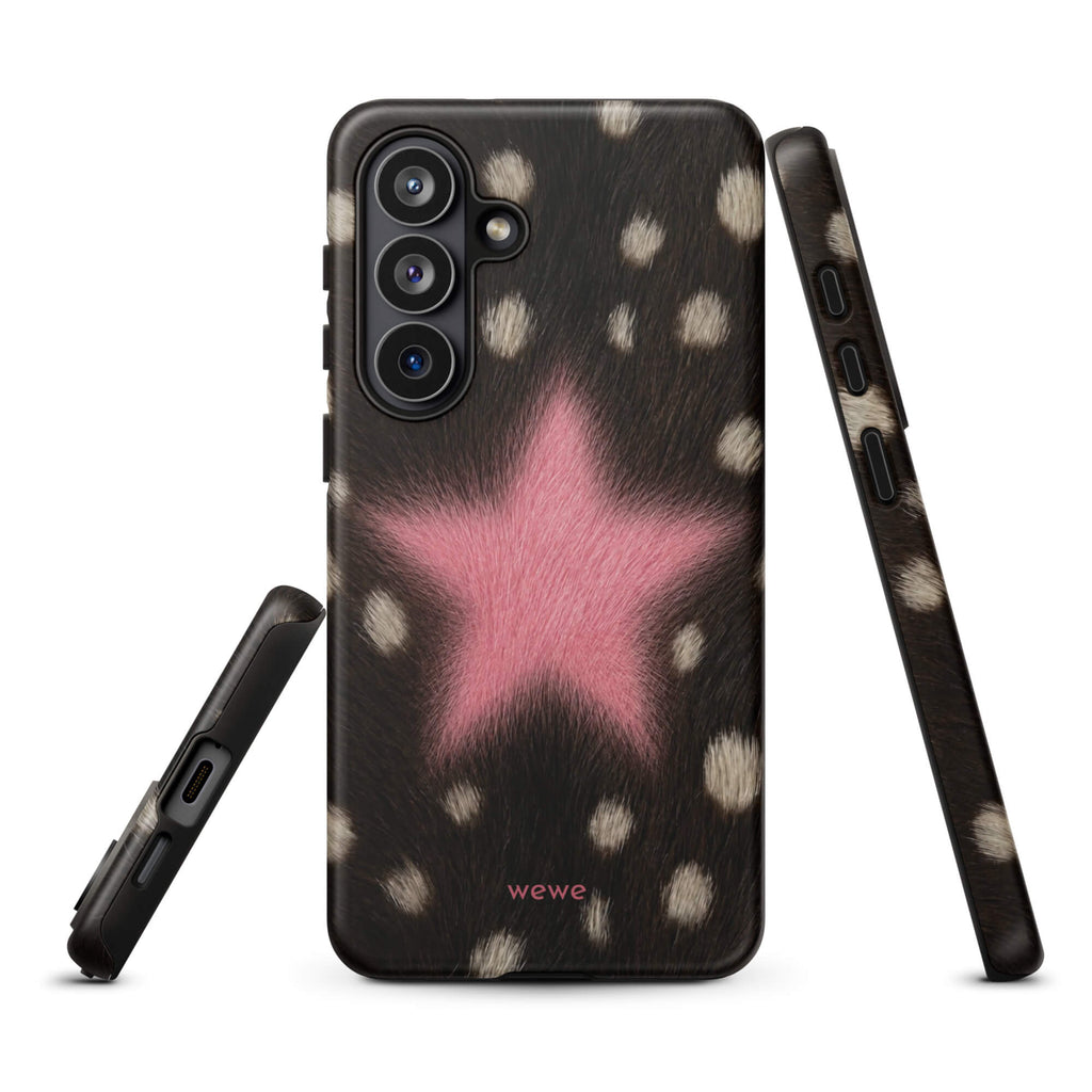 Dark brown, black and cream cow-print iPhone case with a large soft-focus bubblegum-pink fuzzy star