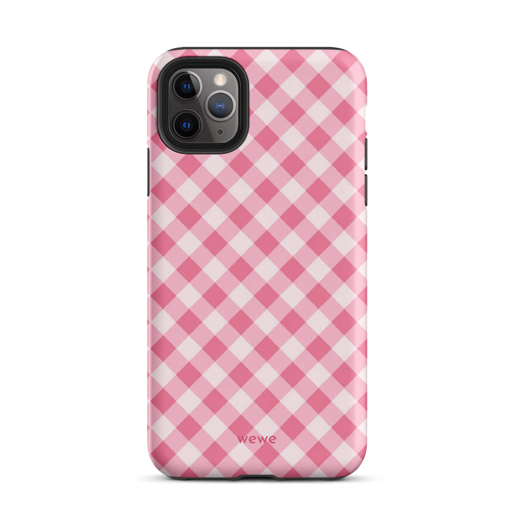 Bubblegum-pink and soft-white iPhone case with an evenly repeated gingham check pattern