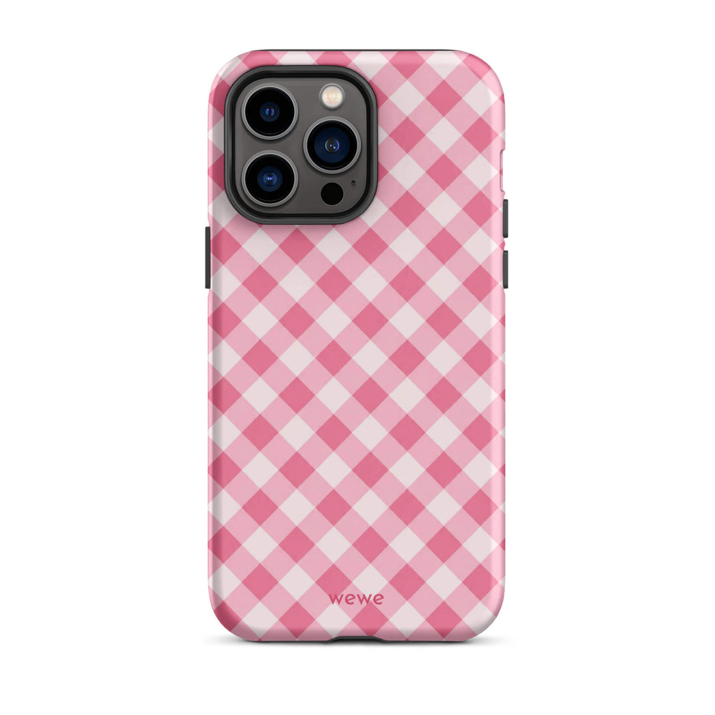 Bubblegum-pink and soft-white iPhone case with an evenly repeated gingham check pattern