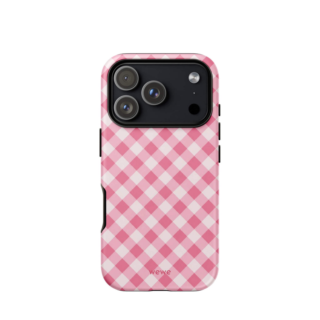Bubblegum-pink and soft-white iPhone case with an evenly repeated gingham check pattern
