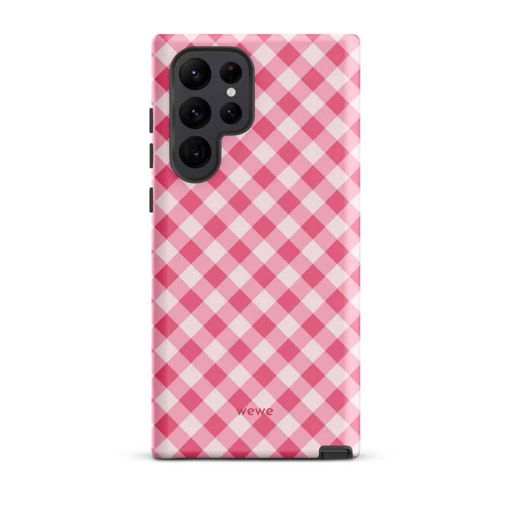 Bubblegum-pink and soft-white iPhone case with an evenly repeated gingham check pattern