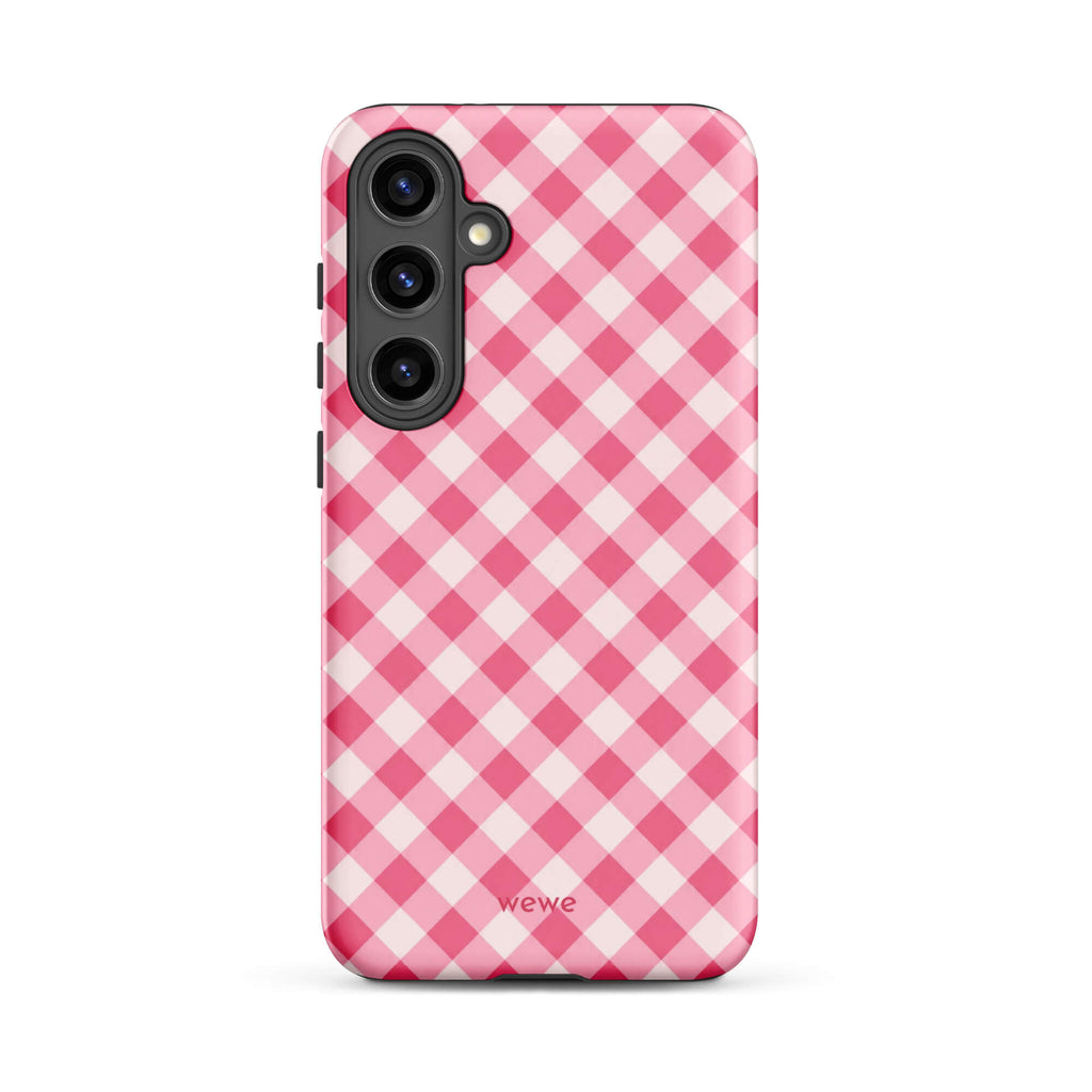 Bubblegum-pink and soft-white iPhone case with an evenly repeated gingham check pattern