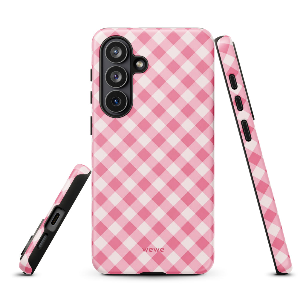 Bubblegum-pink and soft-white iPhone case with an evenly repeated gingham check pattern