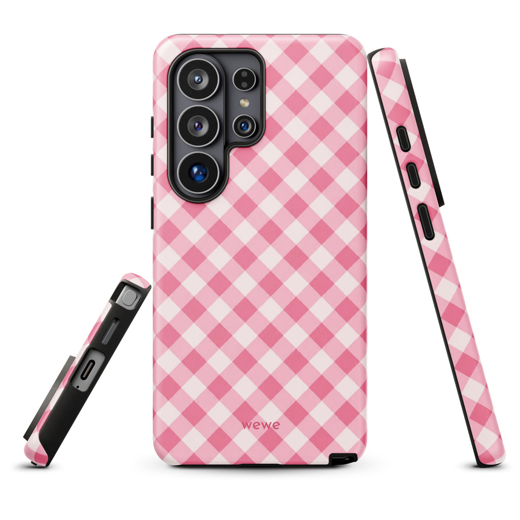 Bubblegum-pink and soft-white iPhone case with an evenly repeated gingham check pattern