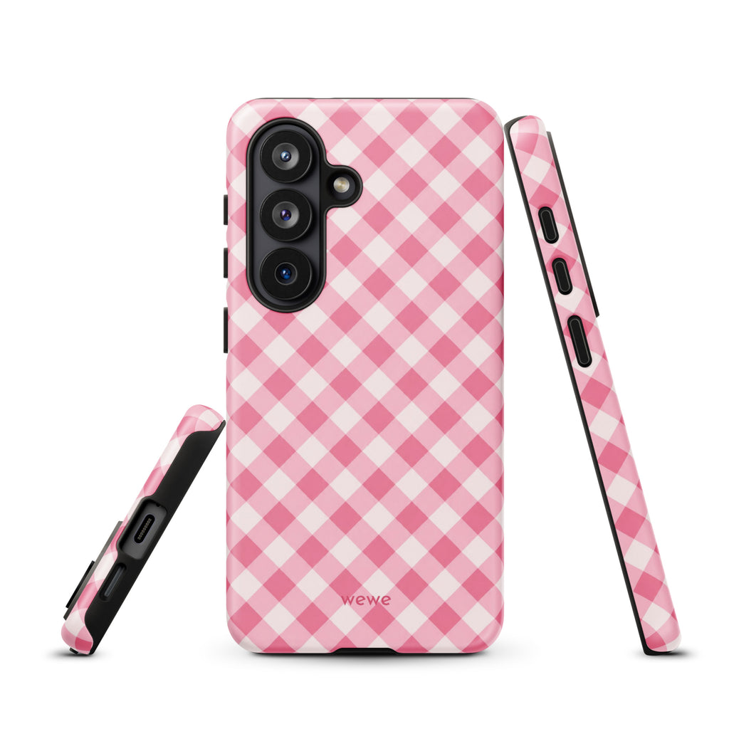 Bubblegum-pink and soft-white iPhone case with an evenly repeated gingham check pattern