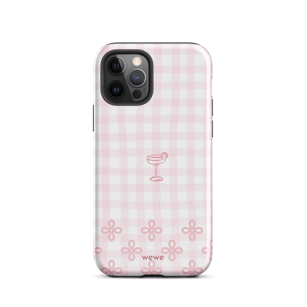 Custom iPhone case 12 pro with pink and white gingham checkered pattern, cocktail glass illustration, and ribbon designs.