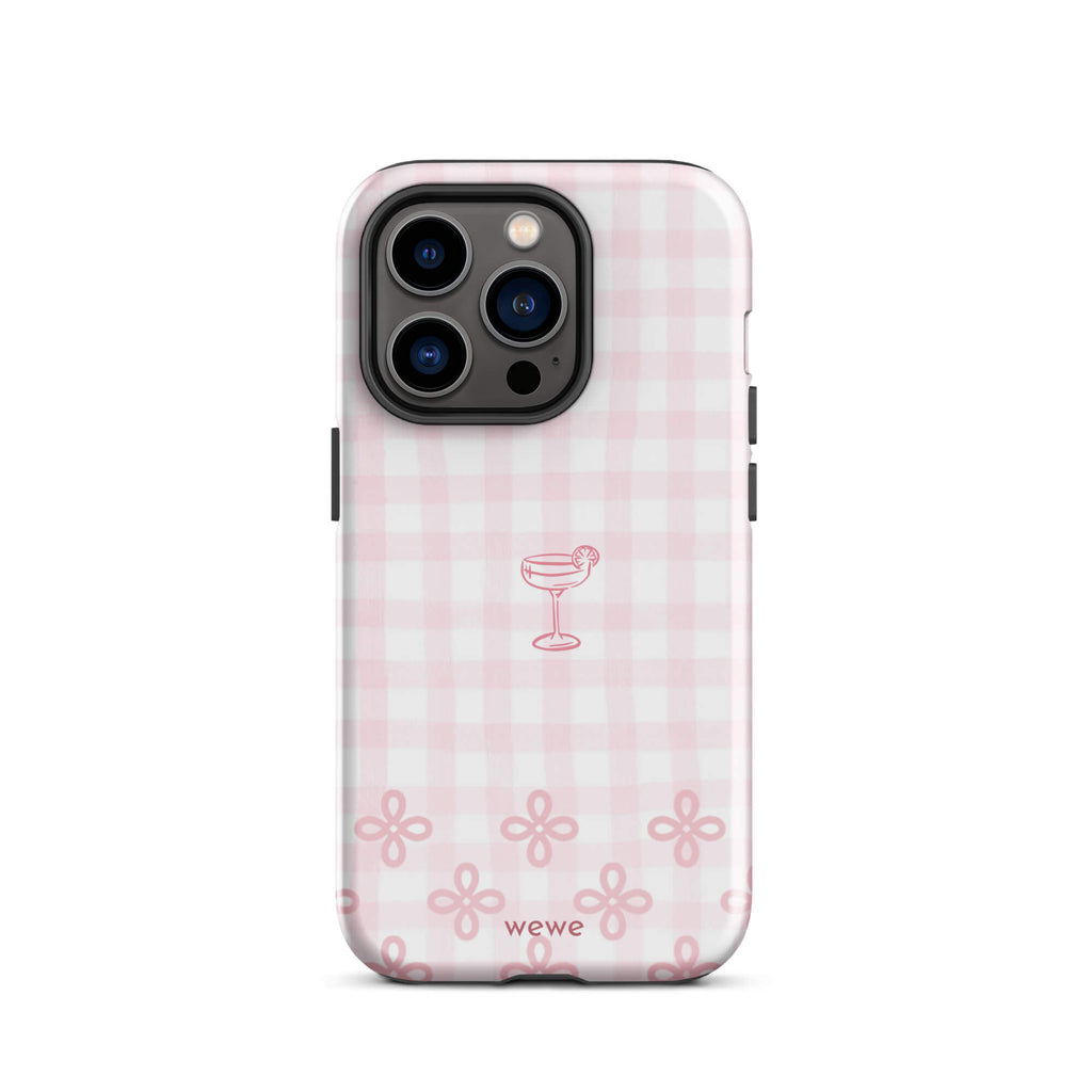 Custom iPhone case 14 pro with pink and white gingham checkered pattern, cocktail glass illustration, and ribbon designs.
