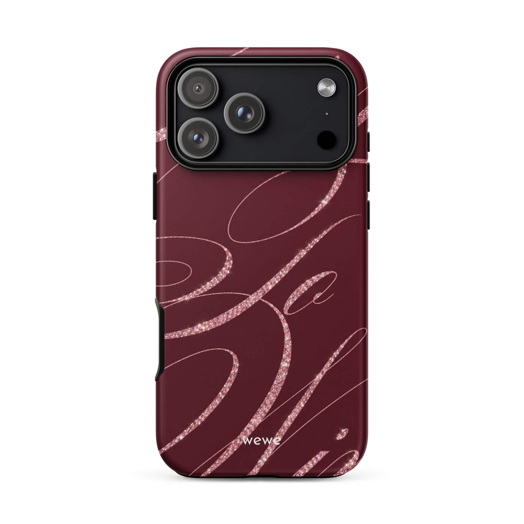 Deep burgundy iPhone case with flowing pink glitter-effect lines and looping abstract swirls