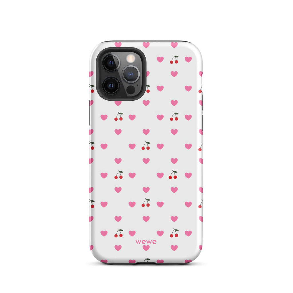 Custom iPhone case 12 pro with a seamless texture pattern of small pink hearts and red cherries on a white background.