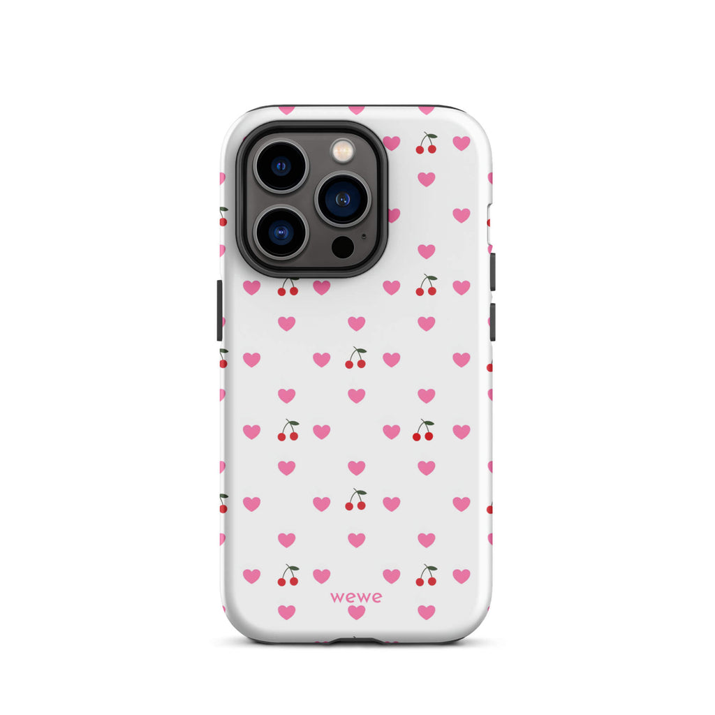 Custom iPhone case 14 pro with a seamless texture pattern of small pink hearts and red cherries on a white background.