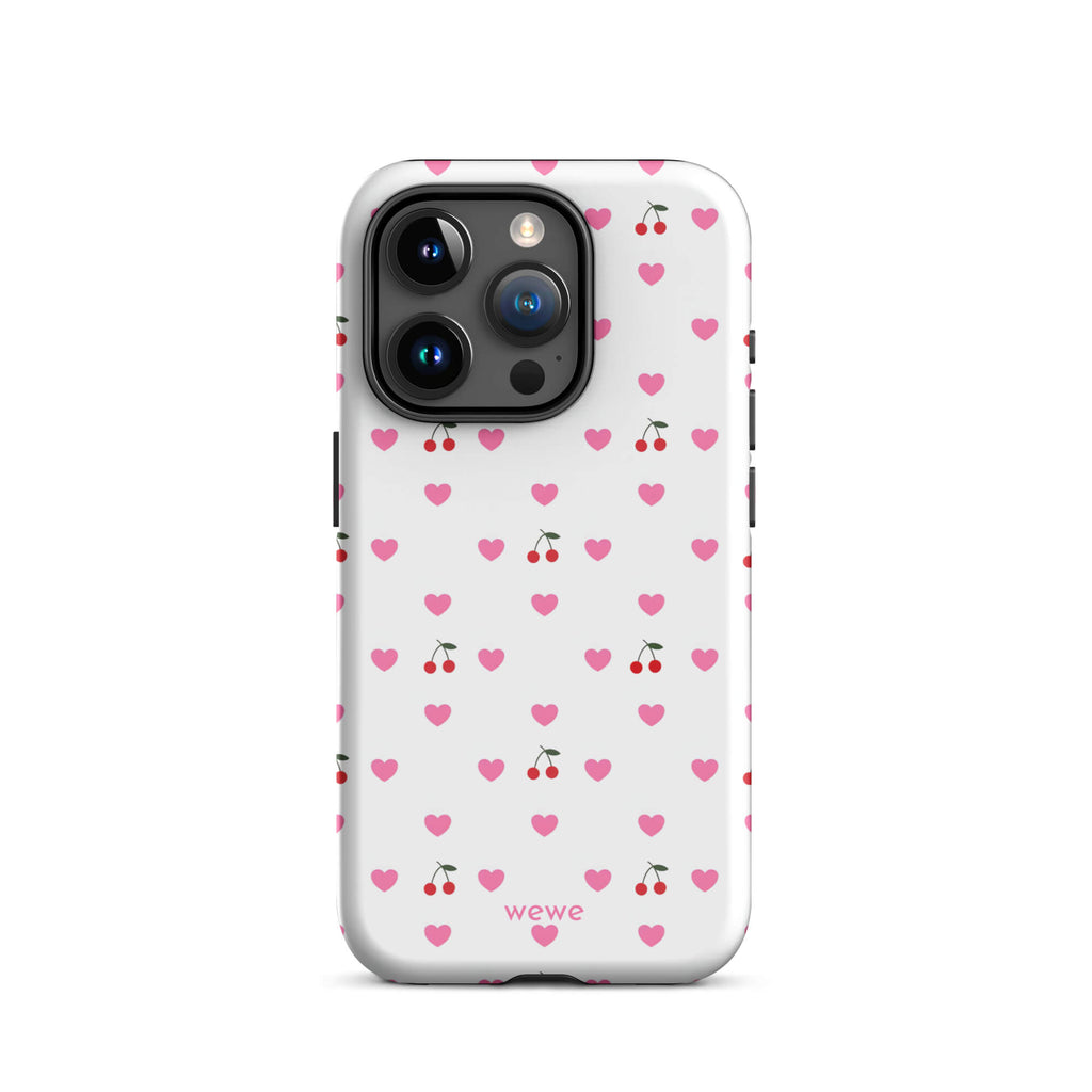 Custom iPhone case 15 pro with a seamless texture pattern of small pink hearts and red cherries on a white background.