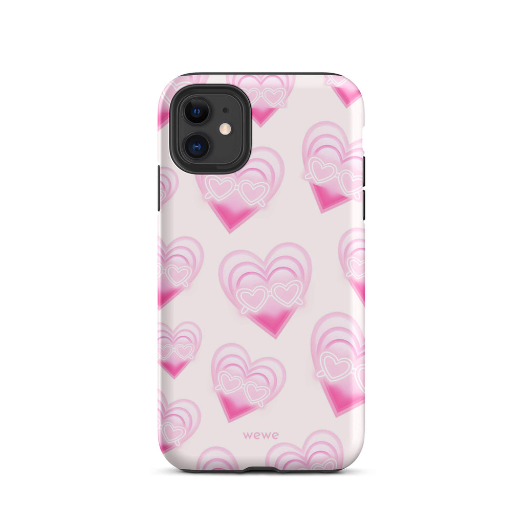 Pink Layered Heart Phone Case featuring oversized retro pink hearts, glowing outlines and a playful heart-shaped glasses motif on a blush background