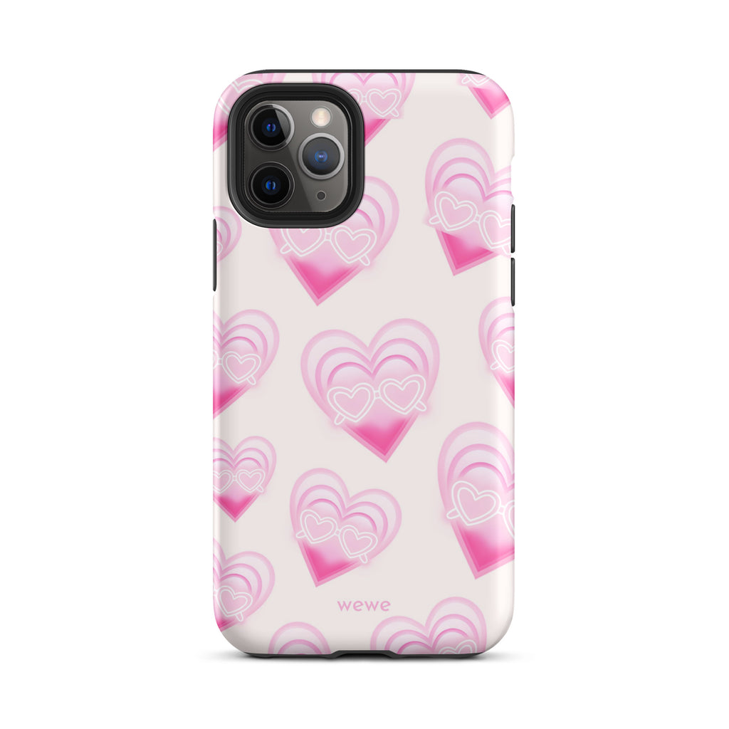 Pink Layered Heart Phone Case featuring oversized retro pink hearts, glowing outlines and a playful heart-shaped glasses motif on a blush background