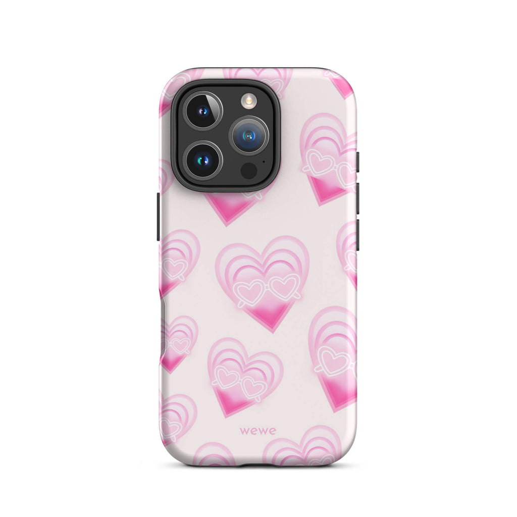 Pink Layered Heart Phone Case featuring oversized retro pink hearts, glowing outlines and a playful heart-shaped glasses motif on a blush background