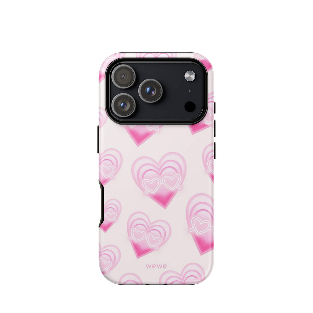 Pink Layered Heart Phone Case featuring oversized retro pink hearts, glowing outlines and a playful heart-shaped glasses motif on a blush background