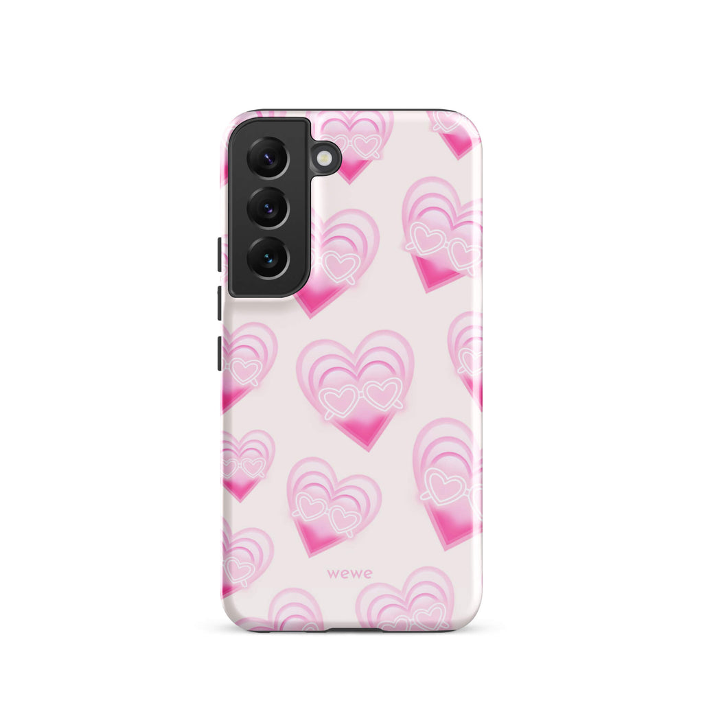 Pink Layered Heart Phone Case featuring oversized retro pink hearts, glowing outlines and a playful heart-shaped glasses motif on a blush background