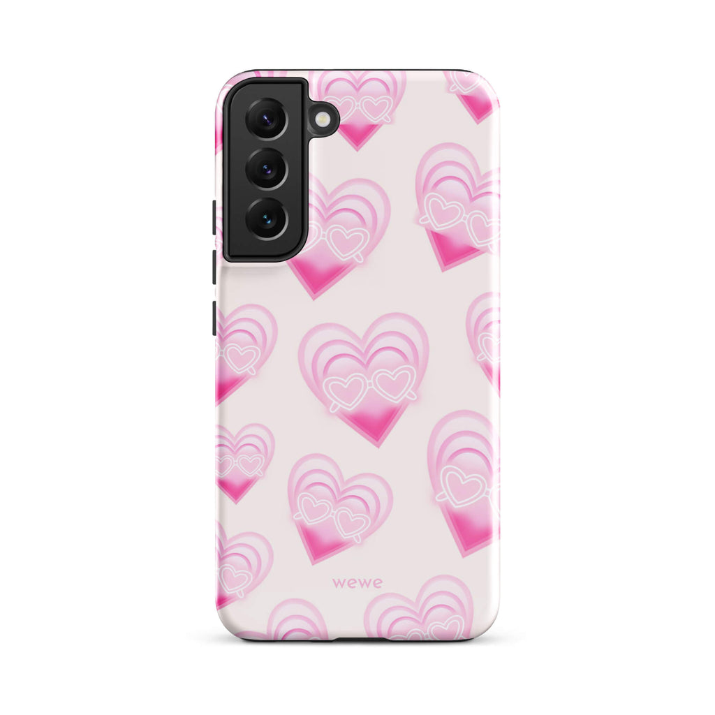 Pink Layered Heart Phone Case featuring oversized retro pink hearts, glowing outlines and a playful heart-shaped glasses motif on a blush background