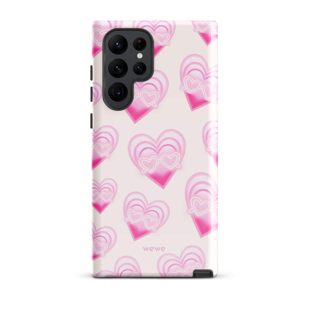 Pink Layered Heart Phone Case featuring oversized retro pink hearts, glowing outlines and a playful heart-shaped glasses motif on a blush background