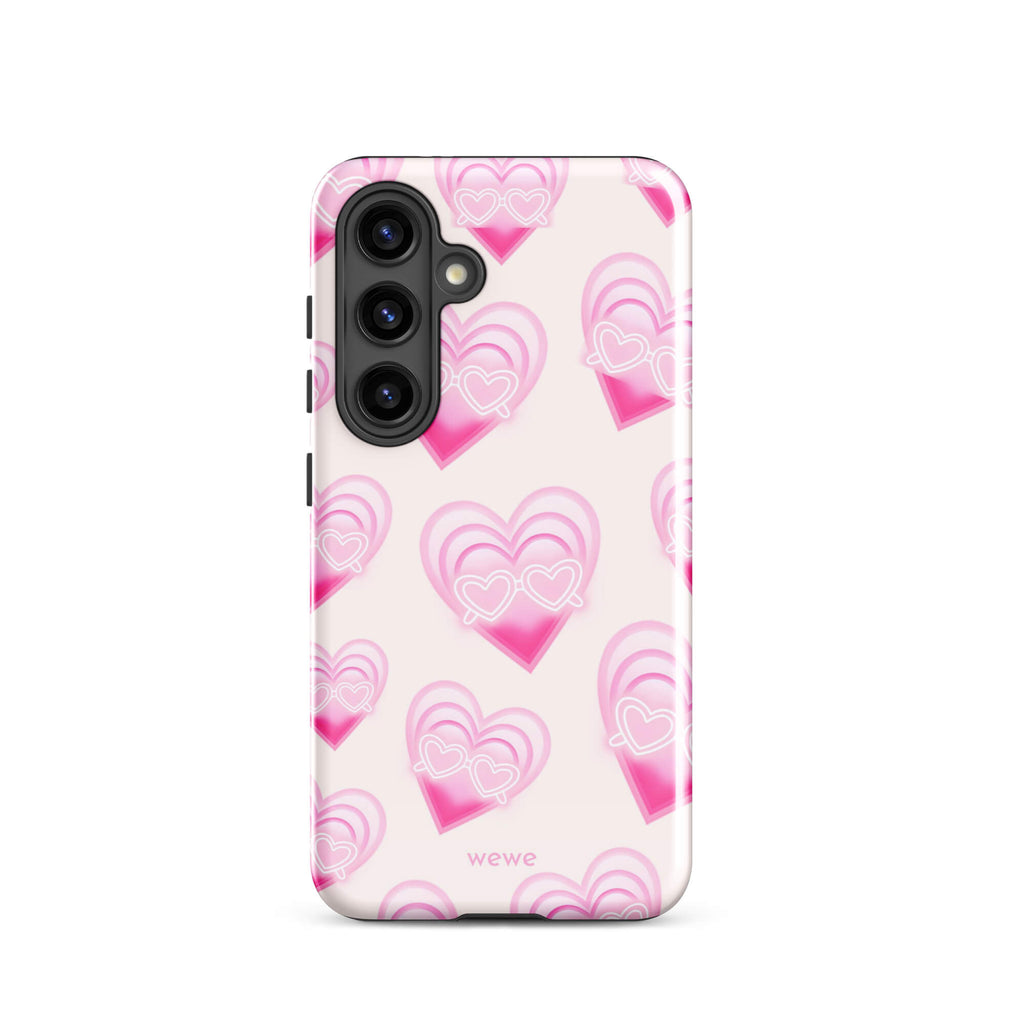 Pink Layered Heart Phone Case featuring oversized retro pink hearts, glowing outlines and a playful heart-shaped glasses motif on a blush background