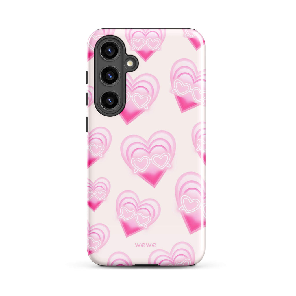 Pink Layered Heart Phone Case featuring oversized retro pink hearts, glowing outlines and a playful heart-shaped glasses motif on a blush background