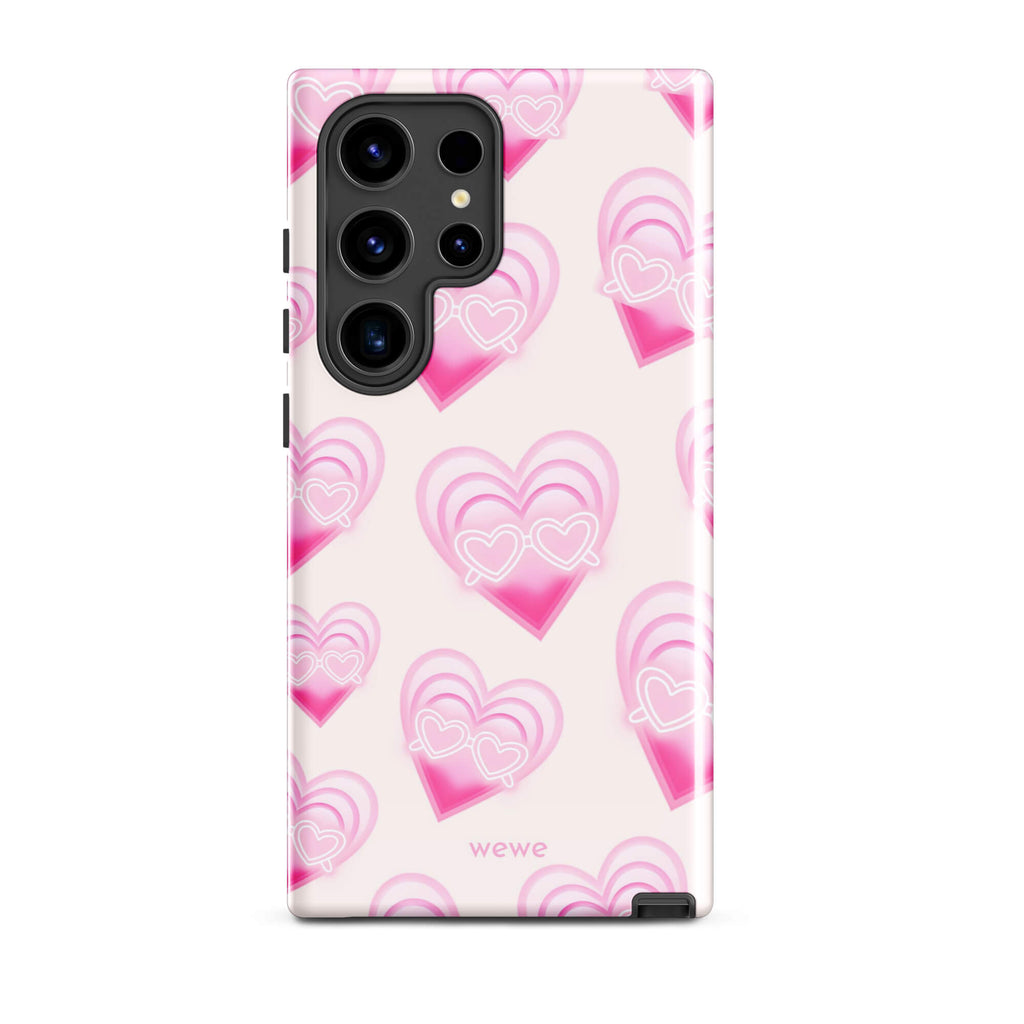 Pink Layered Heart Phone Case featuring oversized retro pink hearts, glowing outlines and a playful heart-shaped glasses motif on a blush background