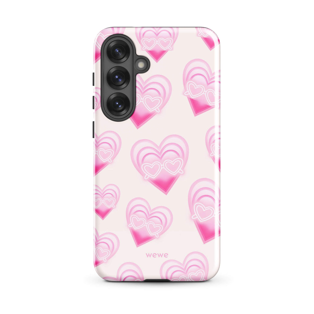 Pink Layered Heart Phone Case featuring oversized retro pink hearts, glowing outlines and a playful heart-shaped glasses motif on a blush background