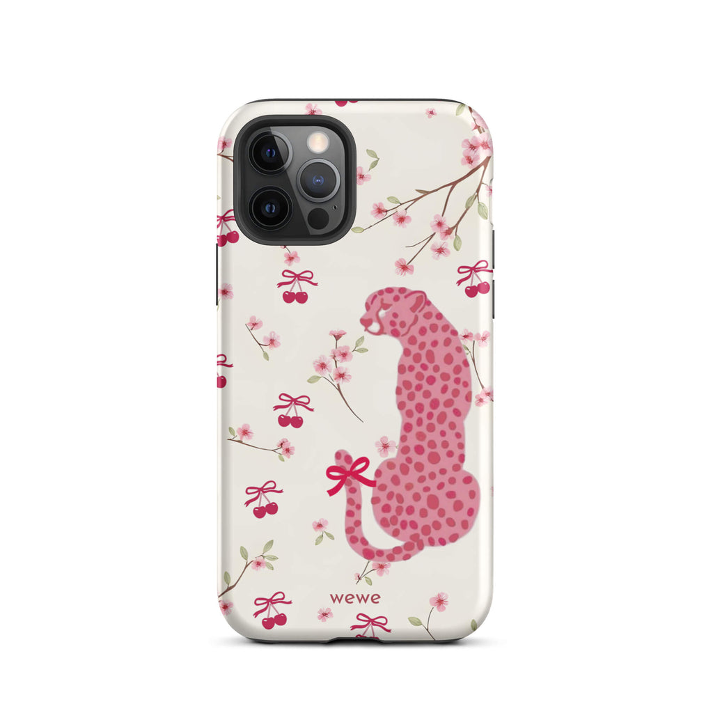 Custom iPhone case 12 pro with a cute pattern of a pink leopard print cheetah and red cherries on a white floral background.