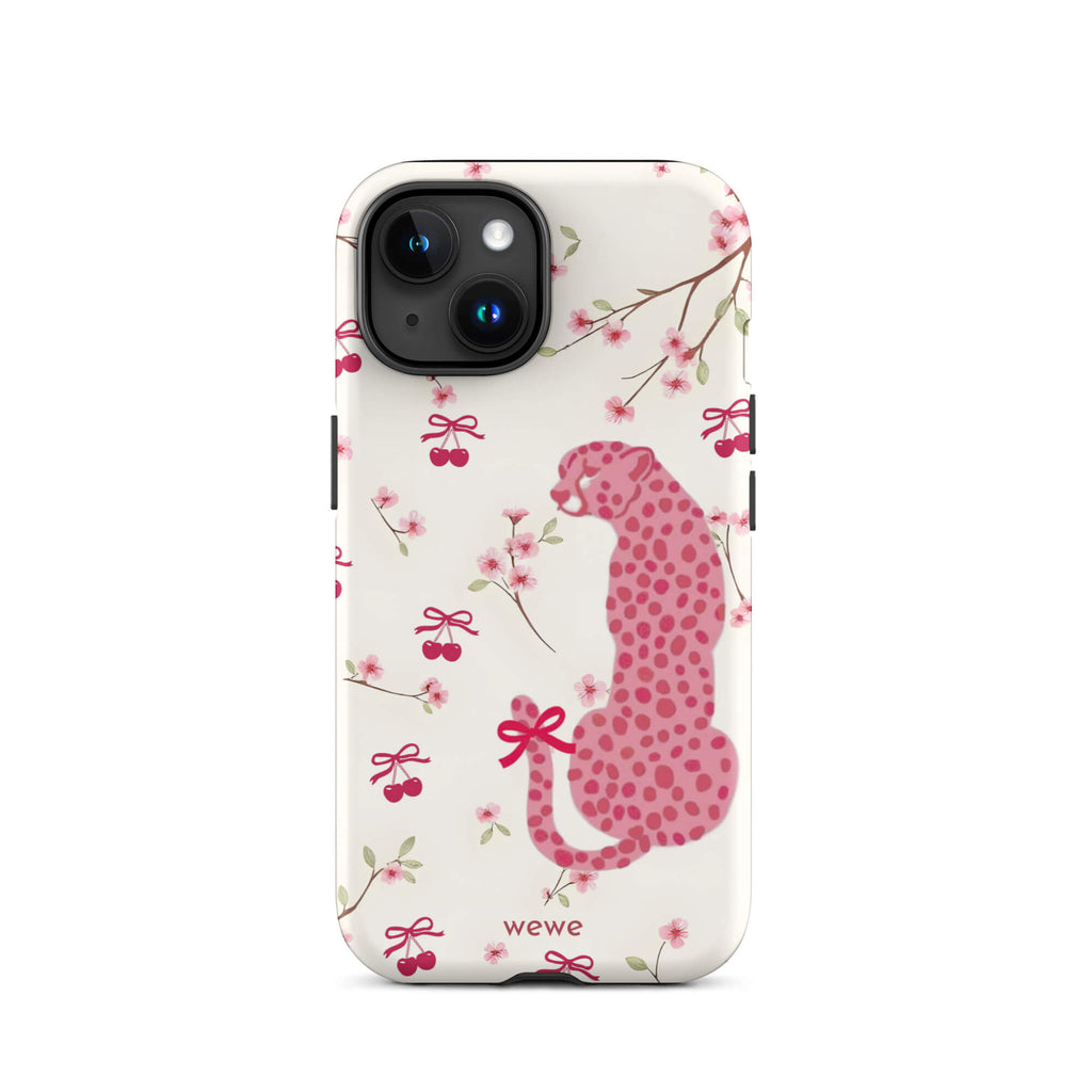Custom iPhone case 15 with a cute pattern of a pink leopard print cheetah and red cherries on a white floral background.