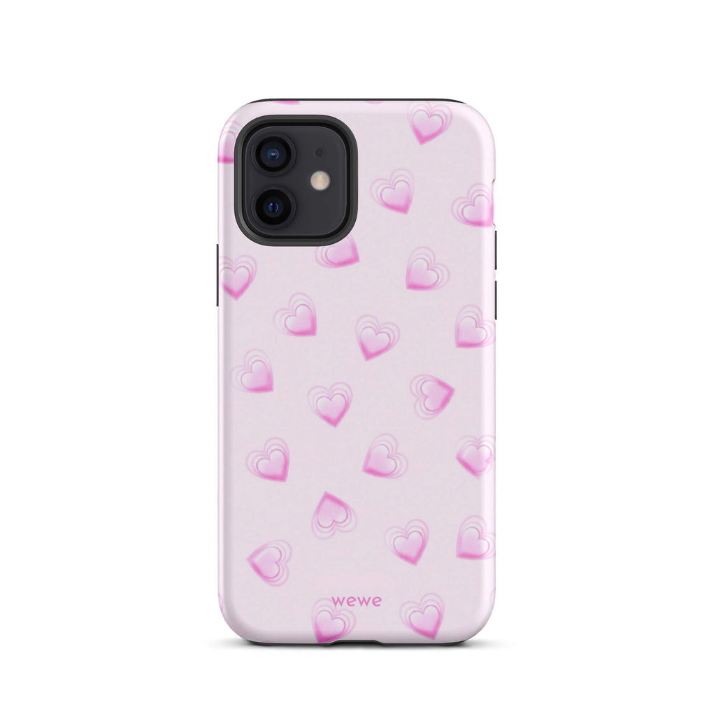 Pink Mini Heart Phone Case featuring scattered small gradient-pink hearts and layered outlines on a pale blush background
