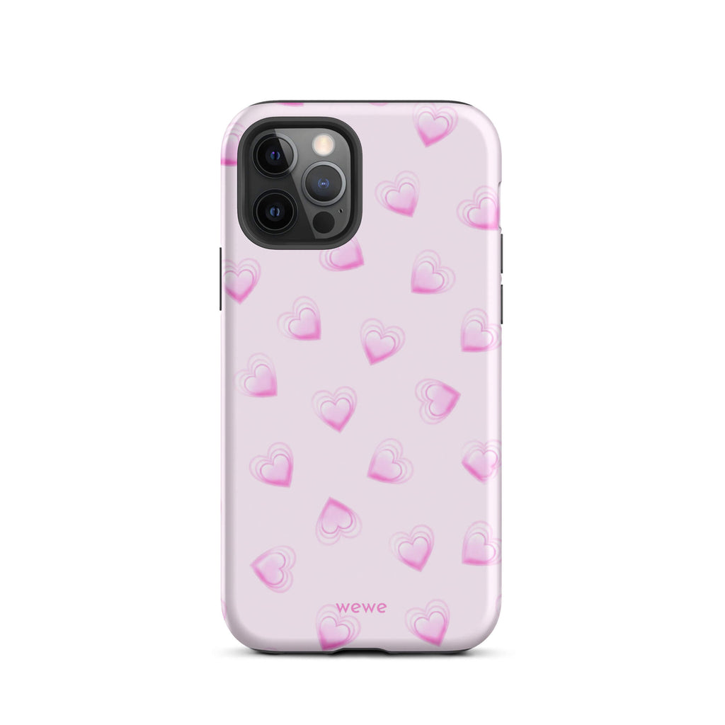Pink Mini Heart Phone Case featuring scattered small gradient-pink hearts and layered outlines on a pale blush background