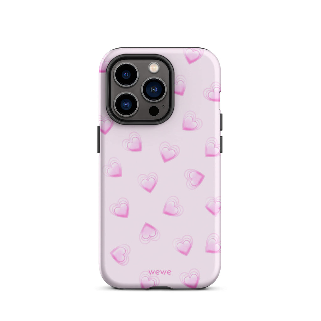 Pink Mini Heart Phone Case featuring scattered small gradient-pink hearts and layered outlines on a pale blush background