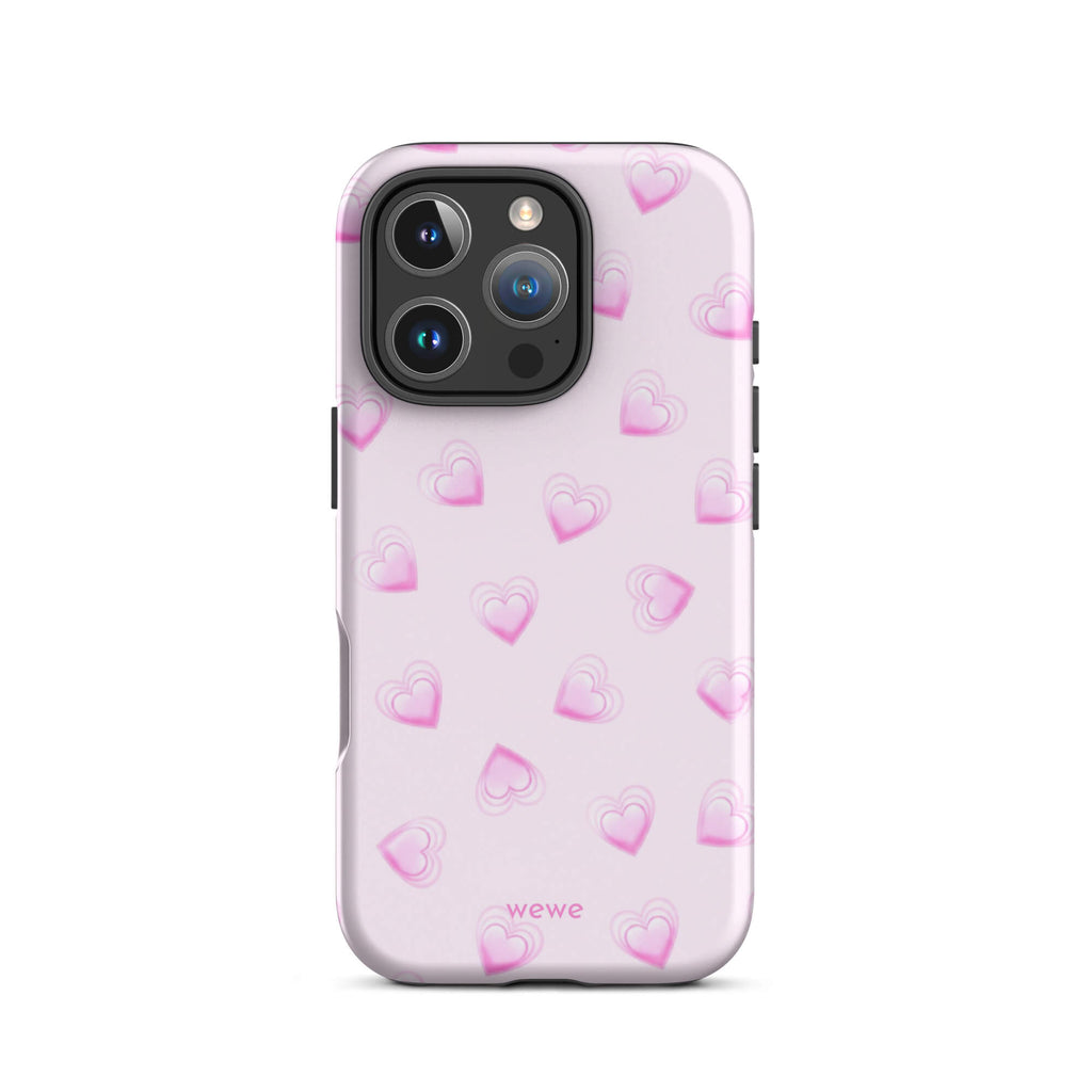 Pink Mini Heart Phone Case featuring scattered small gradient-pink hearts and layered outlines on a pale blush background