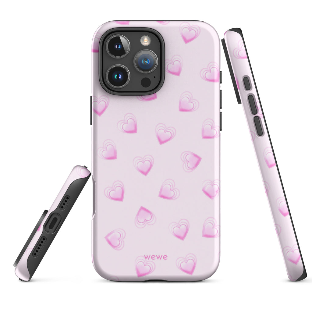 Pink Mini Heart Phone Case featuring scattered small gradient-pink hearts and layered outlines on a pale blush background