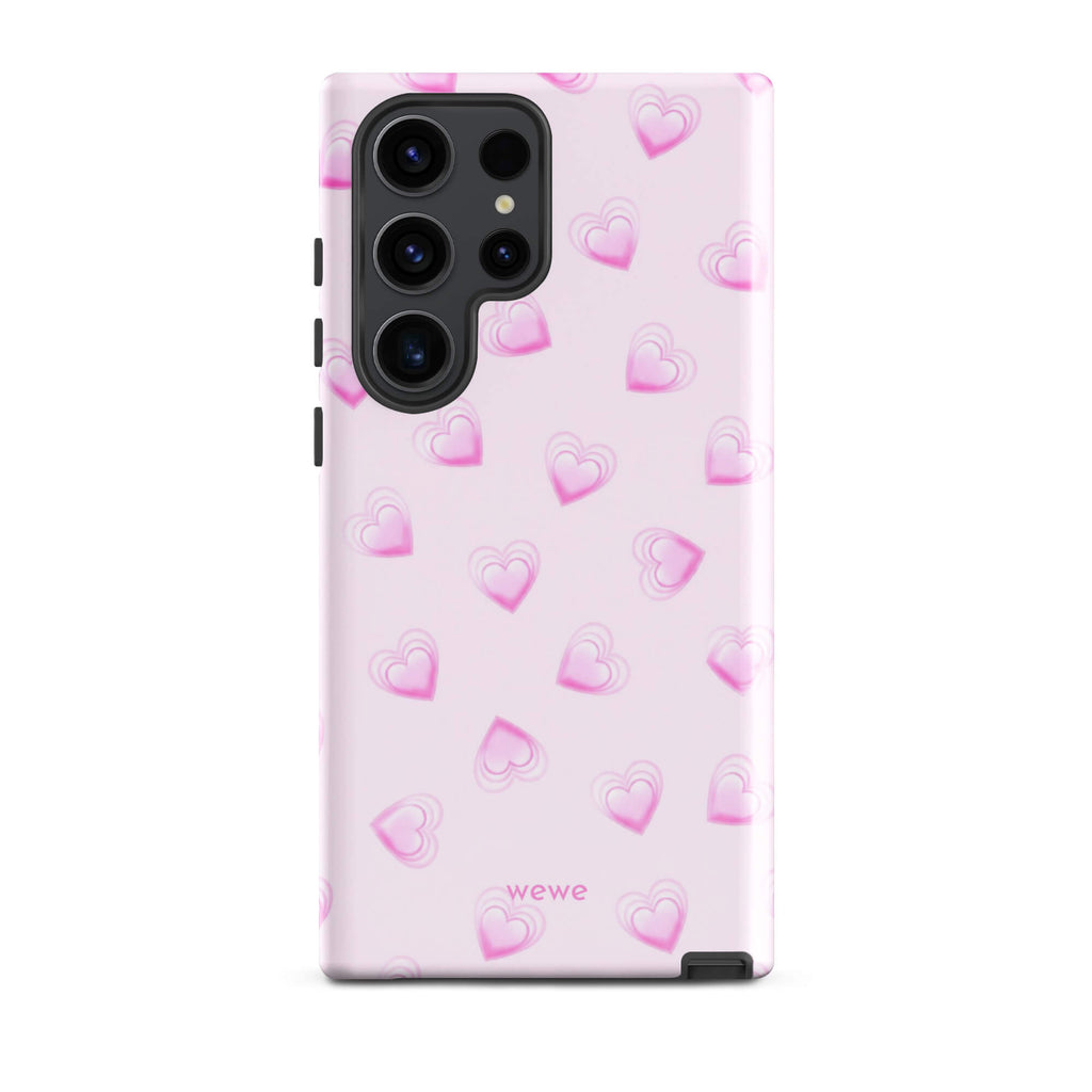 Pink Mini Heart Phone Case featuring scattered small gradient-pink hearts and layered outlines on a pale blush background