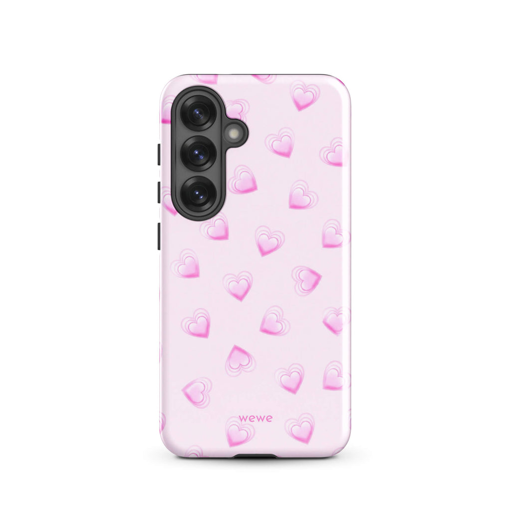 Pink Mini Heart Phone Case featuring scattered small gradient-pink hearts and layered outlines on a pale blush background
