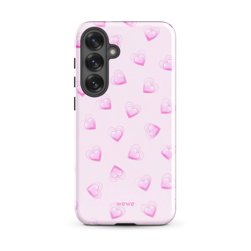 Pink Mini Heart Phone Case featuring scattered small gradient-pink hearts and layered outlines on a pale blush background