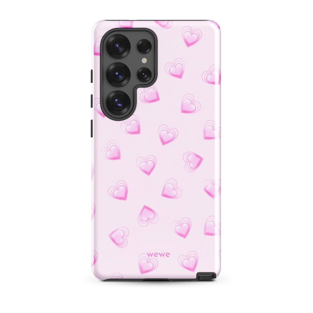 Pink Mini Heart Phone Case featuring scattered small gradient-pink hearts and layered outlines on a pale blush background