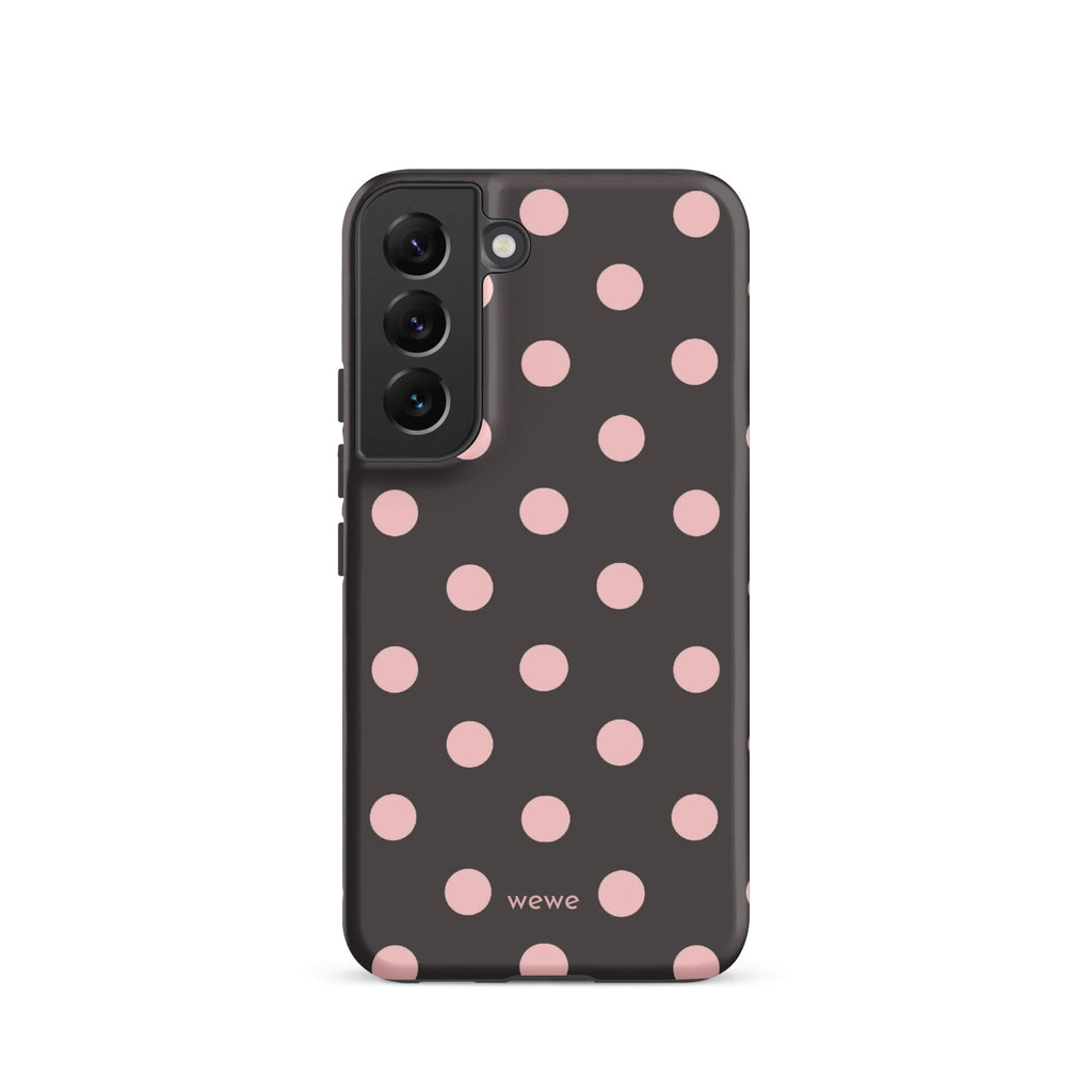 Custom samsung galaxy s22 tough case in matte dark grey/charcoal with large light pink (blush) polka dots and 'wewe' branding at the bottom.