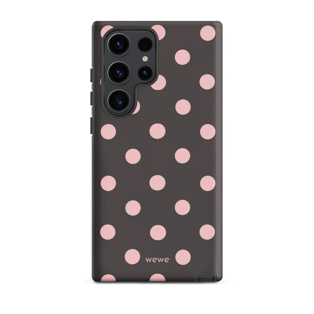 Custom samsung galaxy s23 ultra tough case in matte dark grey/charcoal with large light pink (blush) polka dots and 'wewe' branding at the bottom.