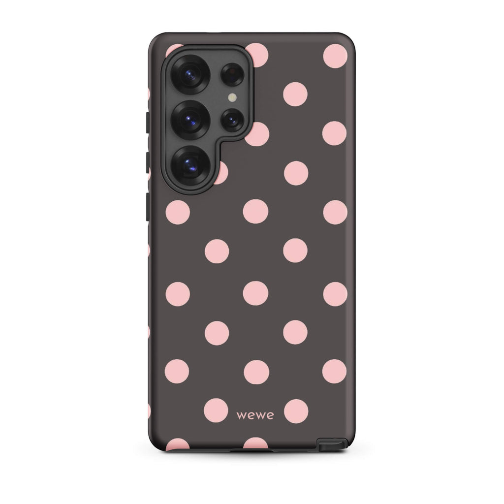 Custom samsung galaxy s25 ultra tough case in matte dark grey/charcoal with large light pink (blush) polka dots and 'wewe' branding at the bottom.