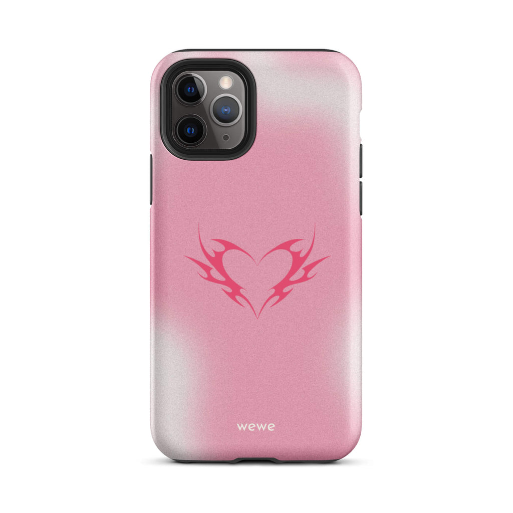 Custom iPhone case 11 pro with a pink and white ombre background and a vibrant pink tribal heart design.