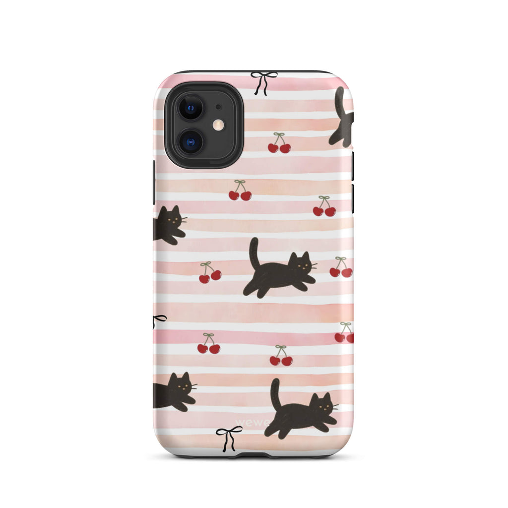 Custom iPhone case 11 pro with a cute pattern of black cats, cherries, and ribbon bows on a pink and white striped background.
