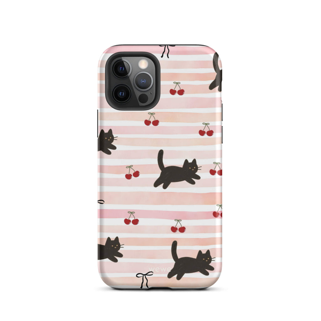 Custom iPhone case 12 pro with a cute pattern of black cats, cherries, and ribbon bows on a pink and white striped background.